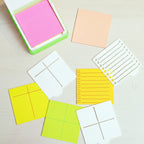 Colorful sticky notes and planner stickers on a light surface