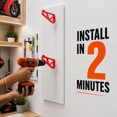 Dirt Accessories helmet hanger being installed on a wall with a drill, showing quick two-minute installation.